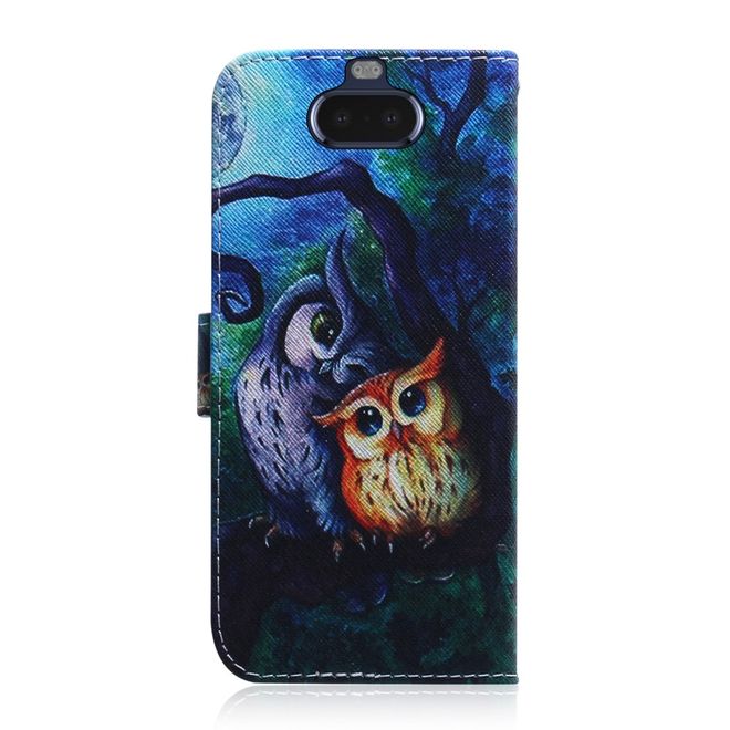 Sony Xperia 8 Handy Hülle - Leder Bookcover Image Series - düstere Eulen