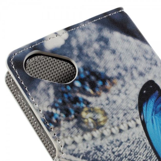 Wiko Sunset2 Leder Case mit wunderschönem, blauem Schmetterling