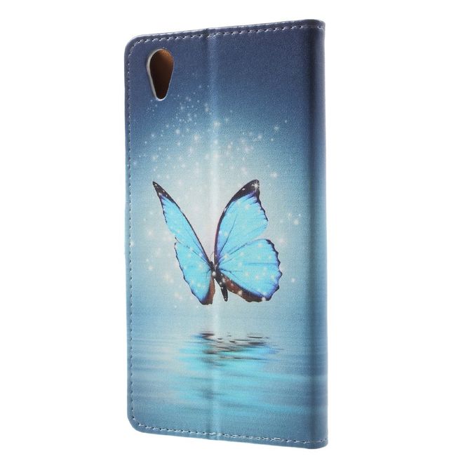 Sony Xperia XA1 Plus Handy Hülle - Leder Book Case - mit Standfunktion - wunderschöner, blauer Schmetterling
