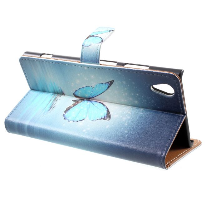 Sony Xperia XA1 Plus Handy Hülle - Leder Book Case - mit Standfunktion - wunderschöner, blauer Schmetterling