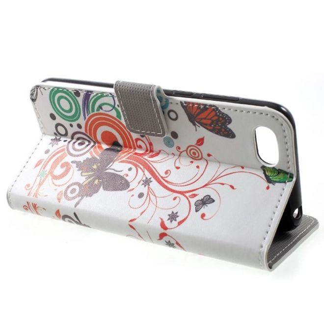 Huawei Honor 7S / Y5 (2018) Handy Hülle - Leder Bookcover Image Series - Schmetterlinge und Kreise