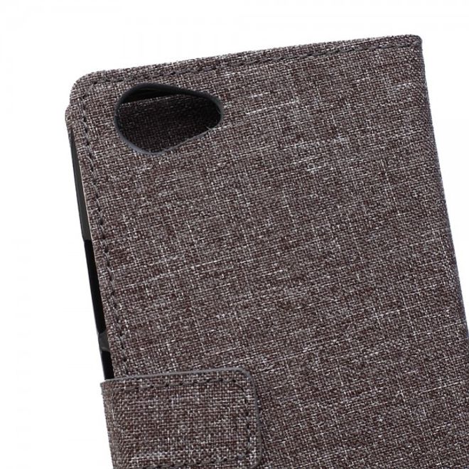 Wiko Rainbow Jam Leder Cover Case mit stoffartiger Textur - grau