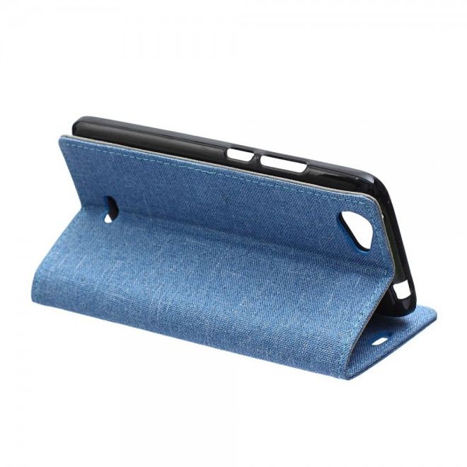 Wiko Rainbow Jam Leder Cover Case mit stoffartiger Textur - hellblau