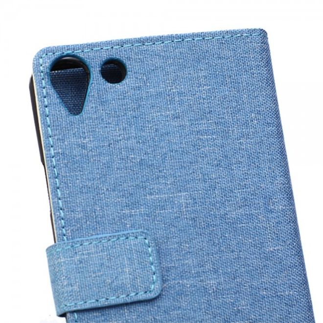 Wiko Selfy 4G Leder Case Hülle mit stoffartiger Textur und Standfunktion - hellblau